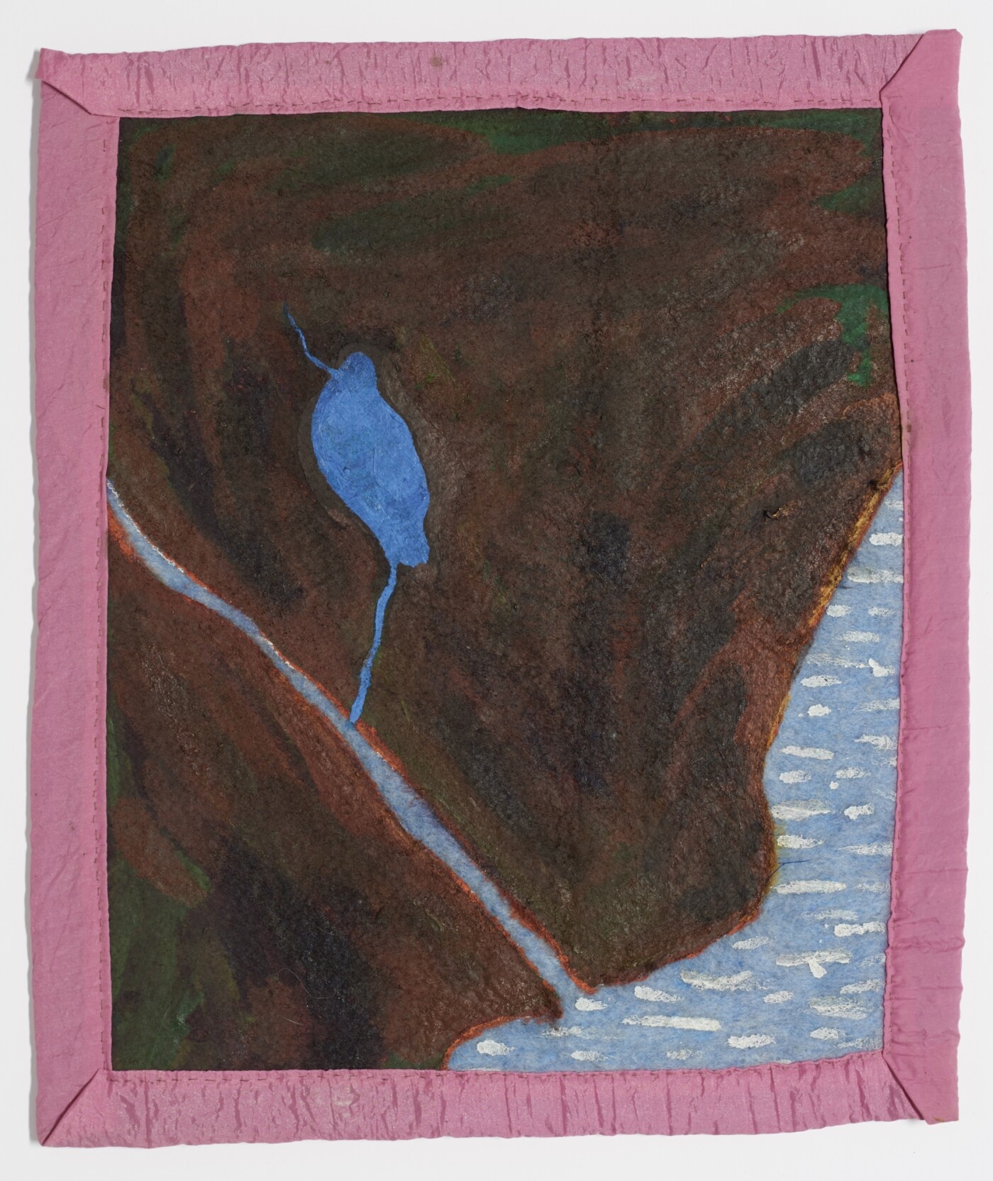 A light blue blanket with pink borders, hung vertically on a wall, shows the contours of a landscape painted onto the blanket from an overhead perspective. Left of center, a lake is painted in deep blue. From the southern tip of the lake, a river emerges. This river joins a wider one that runs diagonally from the left side of the composition towards the bottom, flowing into a bay depicted in the bottom right-hand corner of the blanket. The bay is unpainted, displaying the blue of the fabric support. Short, horizontal marks of white paint suggest the caps of waves.